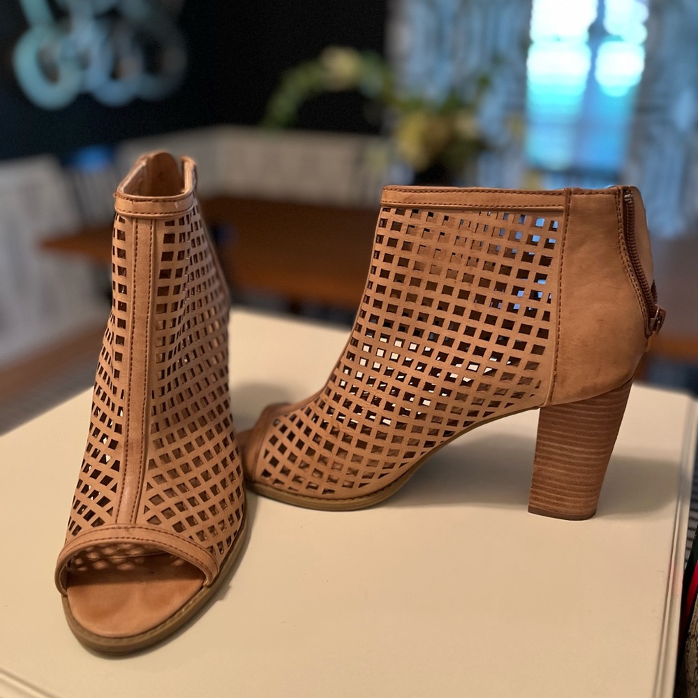 Report cut out leather peep toe heels.